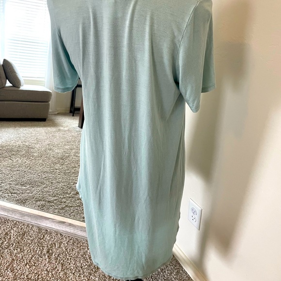 Light green tunic with pocket. Medium. - Picture 2 of 3